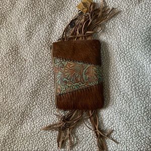Fringe with cowhide wristlet. BNWT